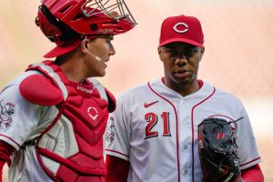 Hunter Greene talks with Tyler Stephenson on the mound