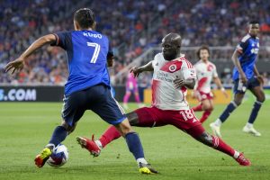 Revolution players in action vs FC Cincinnati