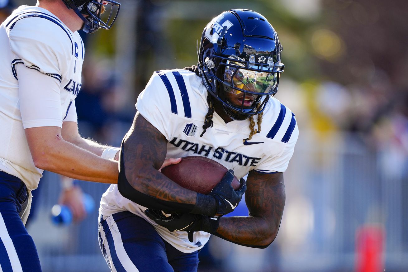 NCAA Football: Utah State at Wyoming